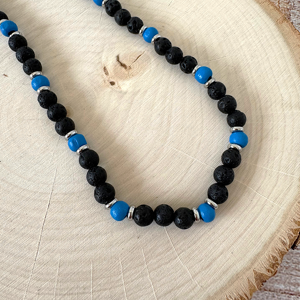 Black Lava and Blue Wood with Silver Rings Mens Necklace On Wood.