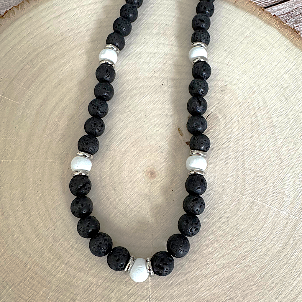 Black Lava and White Wood Mens Beaded Necklace On Light Wood