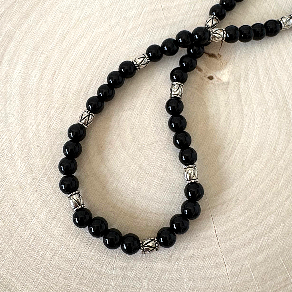 Black Onyx 6mm and Small Silver Barrel Mens Beaded Necklace Displayed