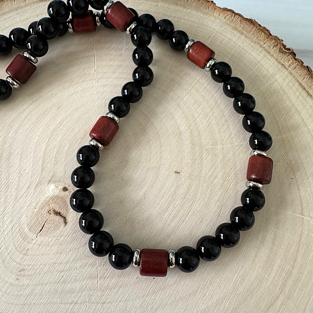 Black Onyx and Rosewood Beaded Mens Necklace On A Display