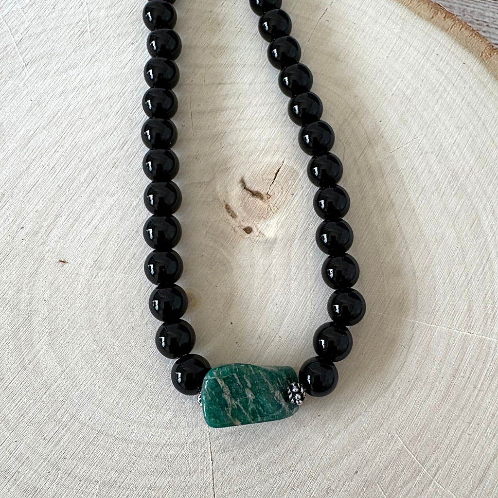 Black Onyx and Russian Amazonite Mens Beaded Necklace On Light Colored Wood