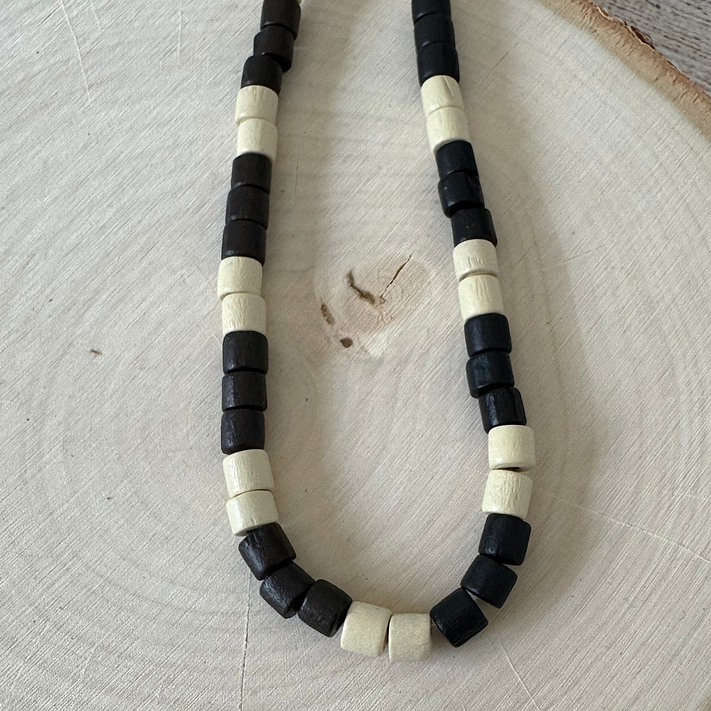 Black and Cream Wood Tube Mens Beaded Necklace On Wood