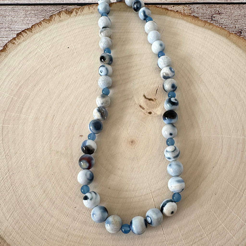 Blue Agate and Blue Onyx Mens Beaded Necklace On Wood.