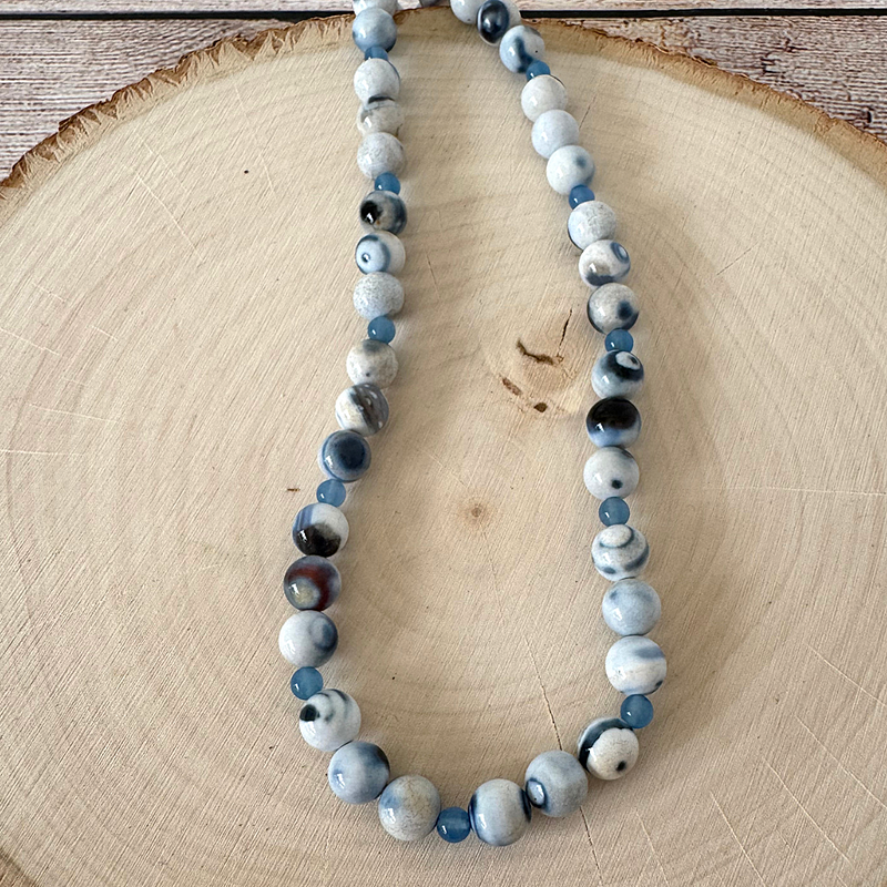 Blue Agate and Blue Onyx Mens Beaded Necklace On Wood.