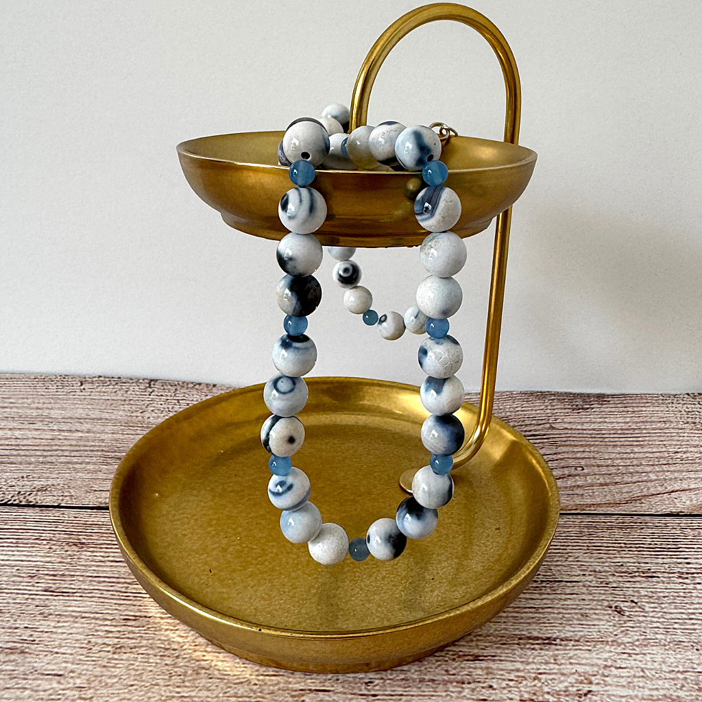 Blue Agate and Blue Onyx Mens Beaded Necklace On A Gold Tray.