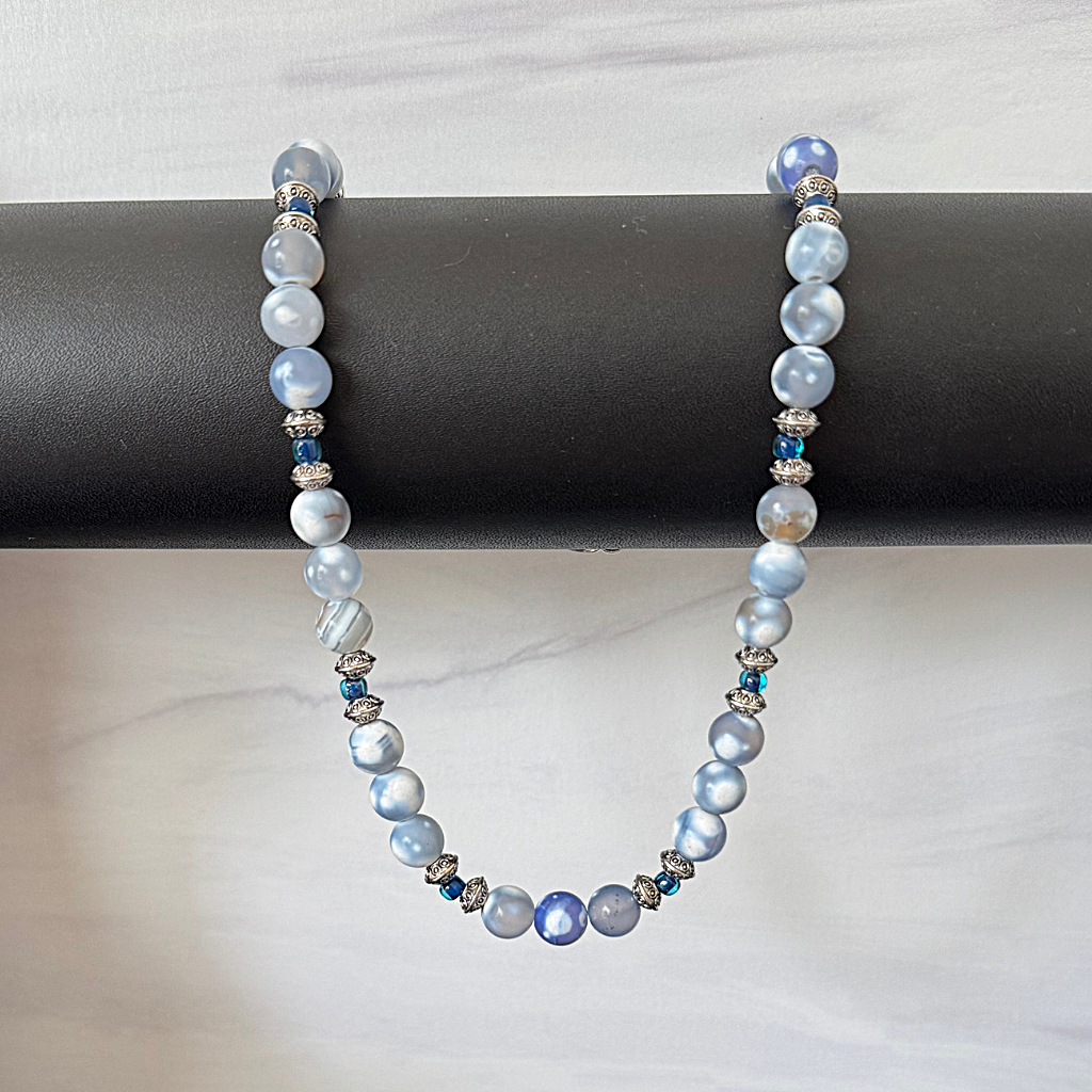 Blue and White Matte Agate and Blue Toho Beaded Necklace On A Bar