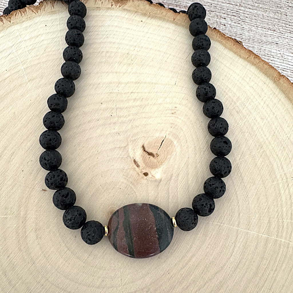 Mens Black Lava and Canyon Marble Beaded Necklace On Wood