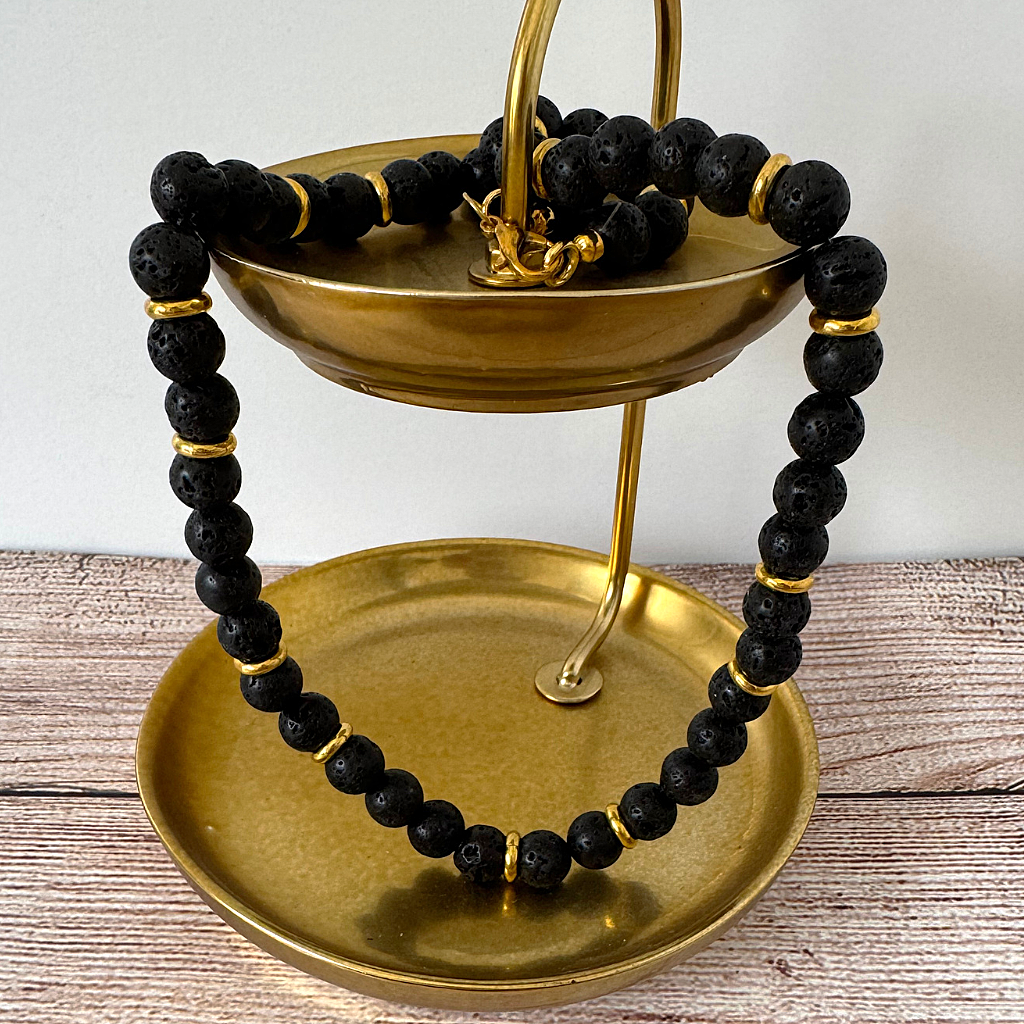 Mens Black Lava and Gold Ring Beaded Necklace On A Gold tray