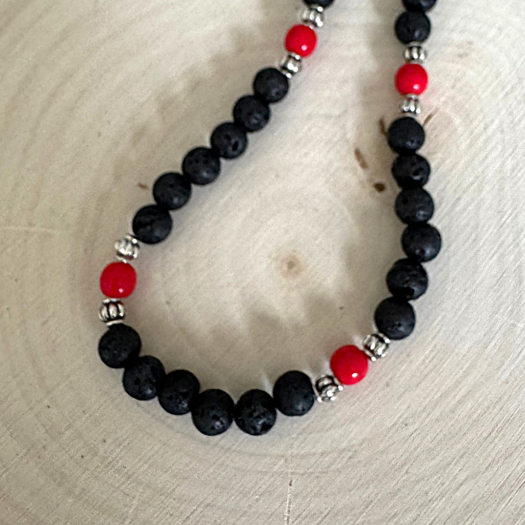Mens Black Lava and Red Czech Beaded Necklace On Wood