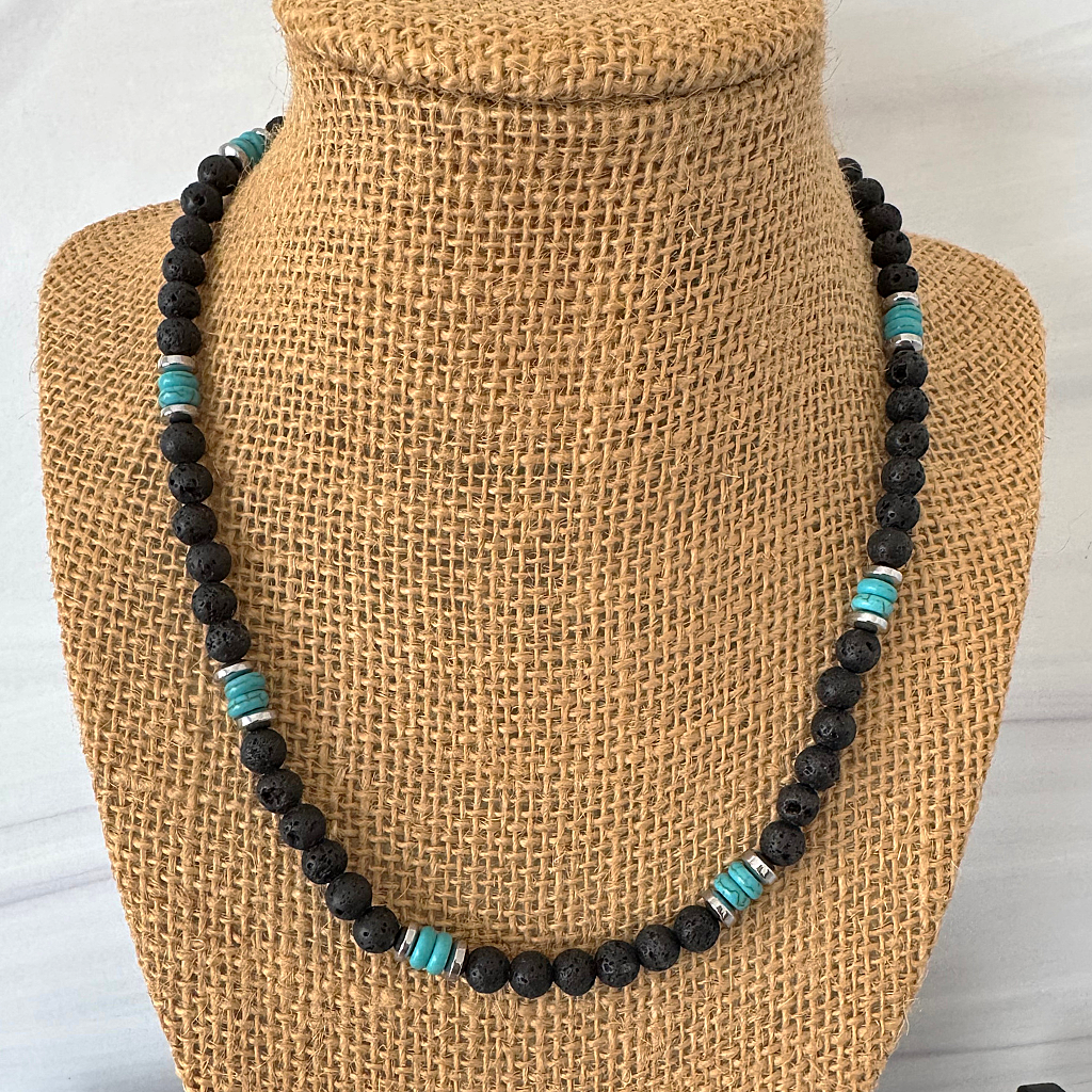 Mens Black Lava and Turquoise Howlite Beaded Necklace on a mannequin bust.