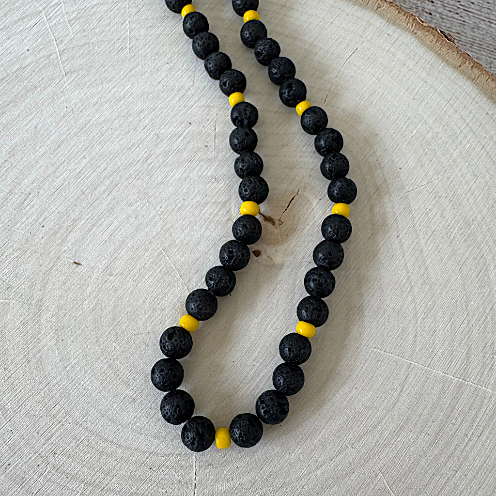 Mens Black Lava and Yellow Toho Beaded Necklace On Wood