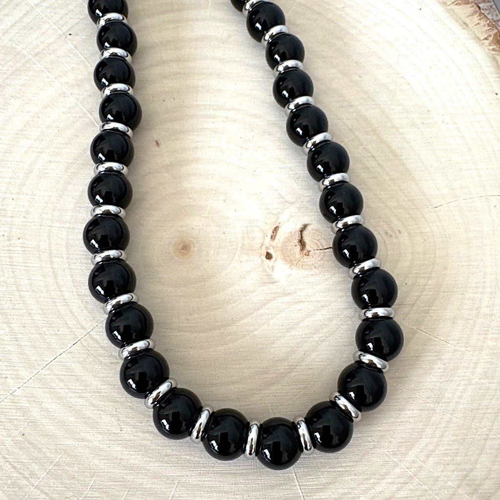 Mens Black Onyx 10mm and Silver Ring Beaded Necklace On Wood