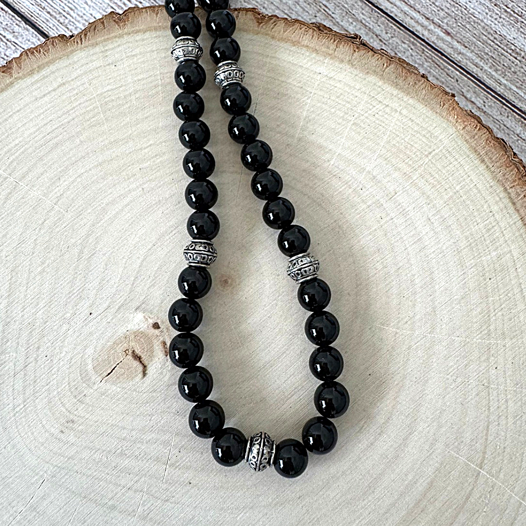 Mens Black Onyx and Silver Barrel Beaded Necklace On Wood