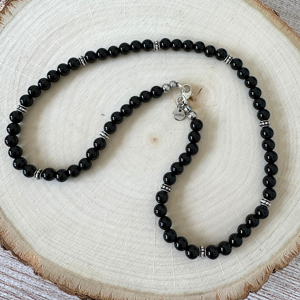 Mens Black Onyx and Silver Beaded Necklace On Light Wood 