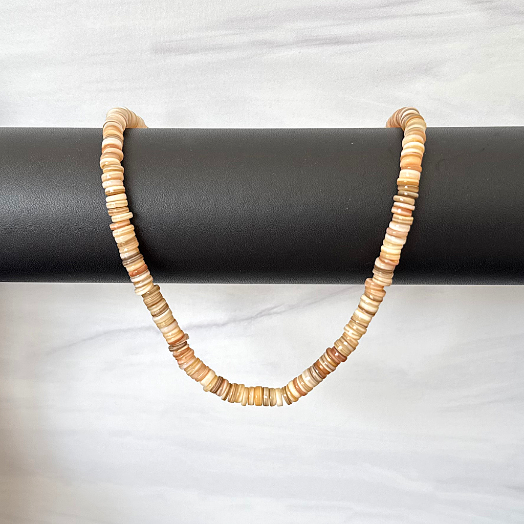 Mens Brown 6mm Shell Disc Beaded Necklace Draped on A Bar