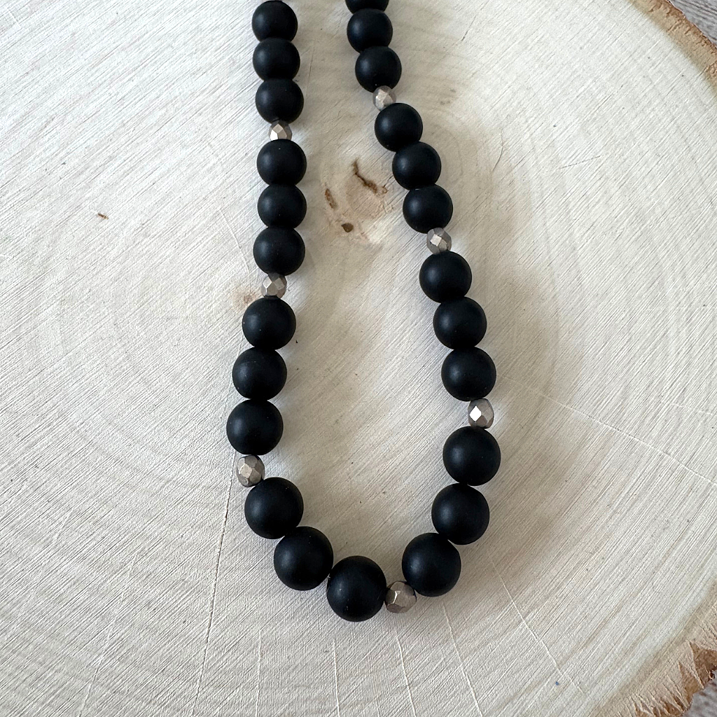 Mens Matte Black Onyx and Gold Czech Beaded Necklace On a Piece of Wood