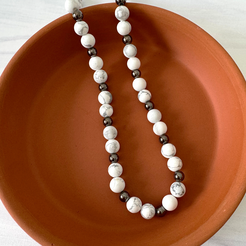 Mens Matte Howlite and Gun Metal Round Beaded Necklace On A Dish