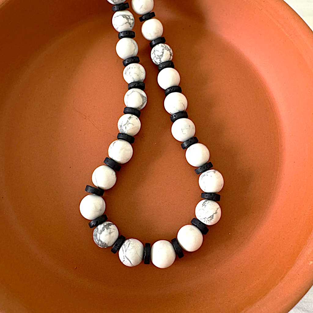 Mens White Howlite and Black Lava Beaded Necklace Displayed