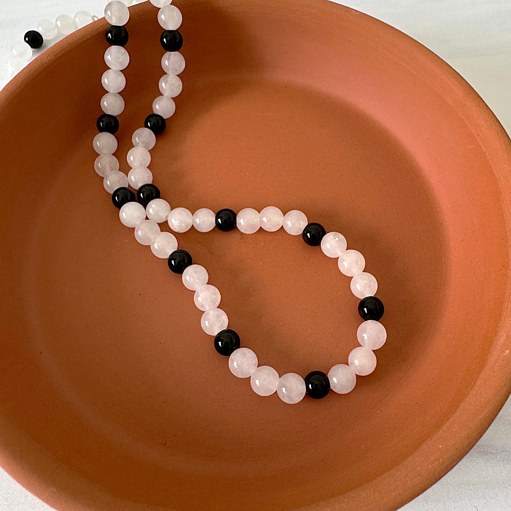 Mens White Jade and Black Onyx Beaded Necklace Displayed