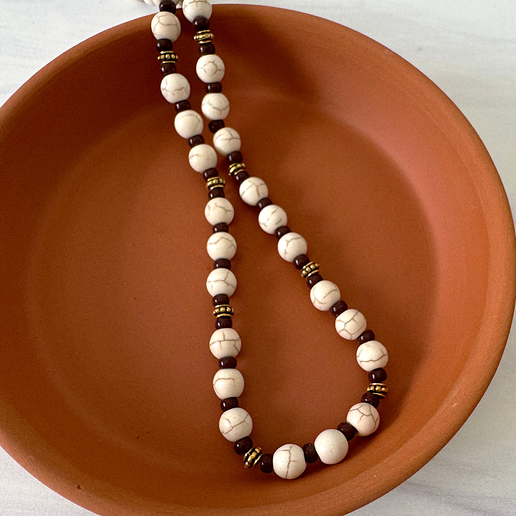 Off White Brown Streaked Agate Mens Beaded Necklace Displayed