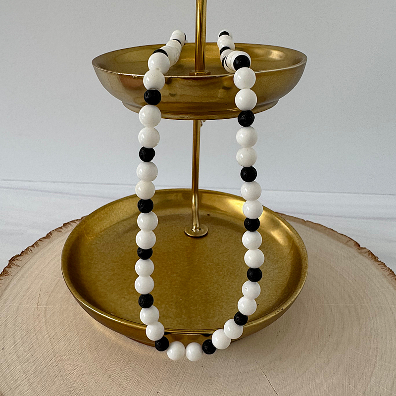 White Shell and Black Lava Mens Beaded Necklace On A Gold Tray