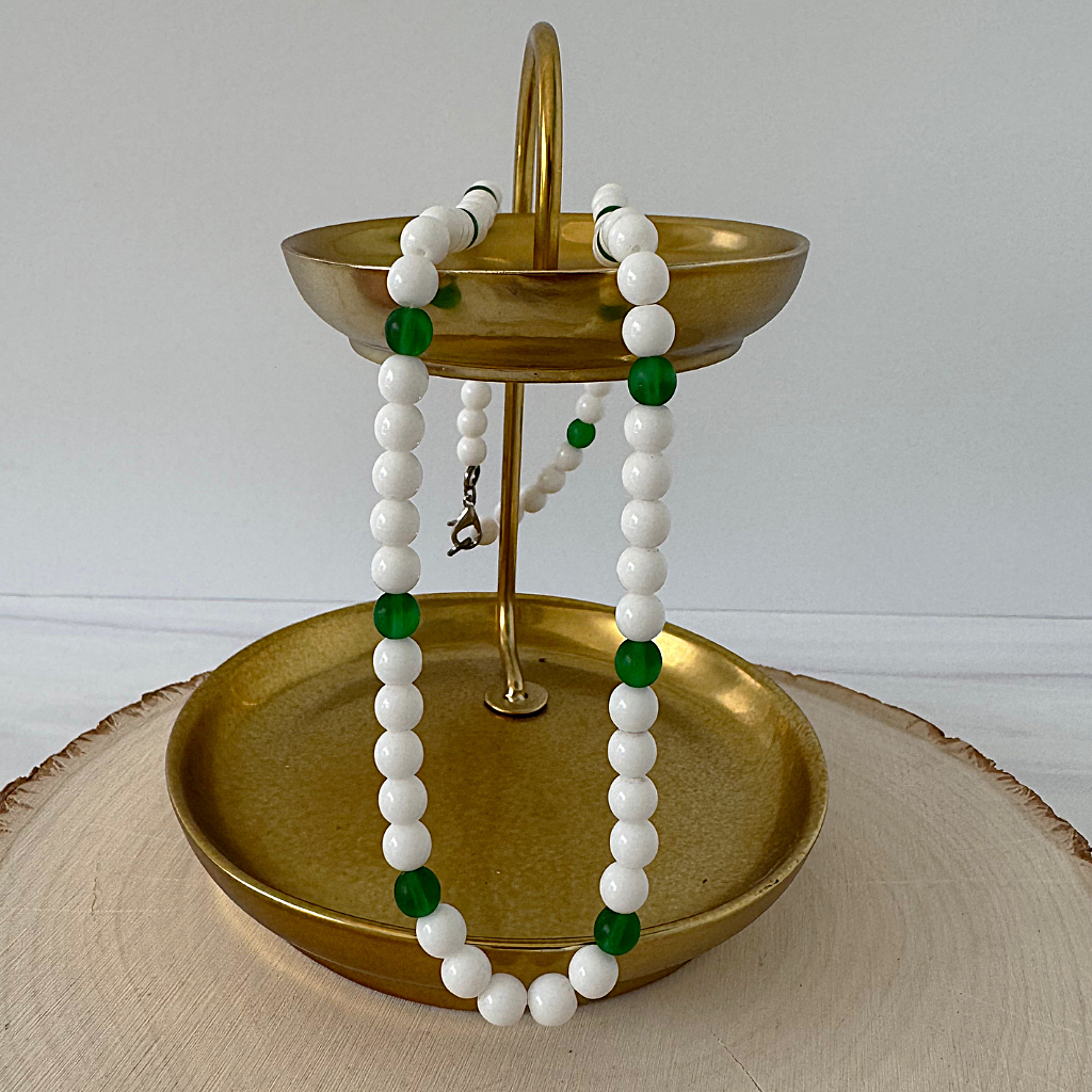 White and Green Beaded Mens Necklace Displayed