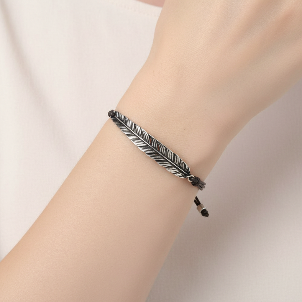 Antique Silver Leaf Bracelet On A Womans Wrist.