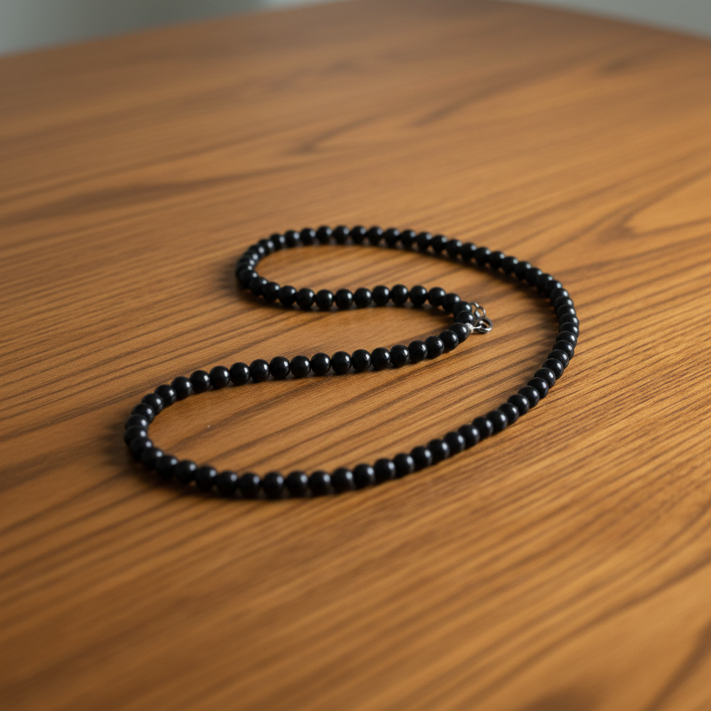 Black Onyx Beaded Necklace on Wood Table