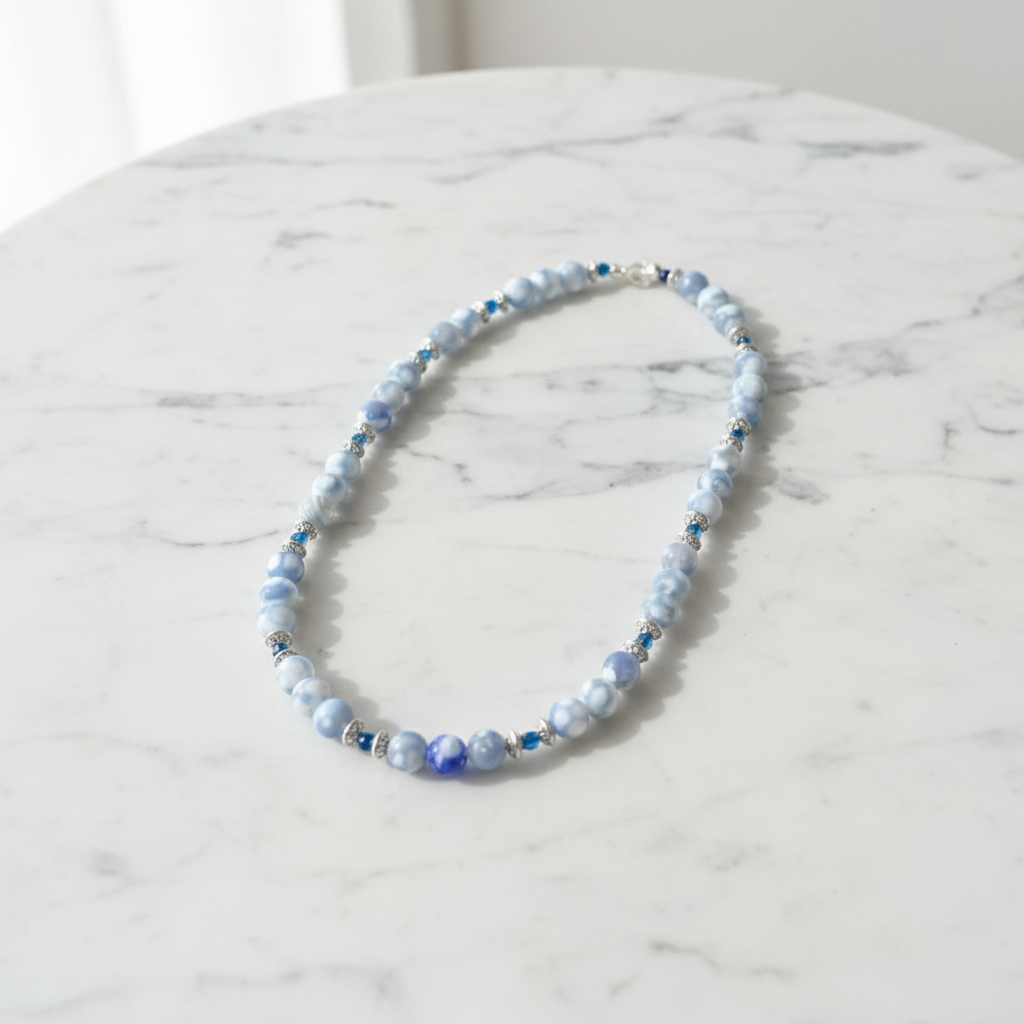Blue Agate Necklace On A Table