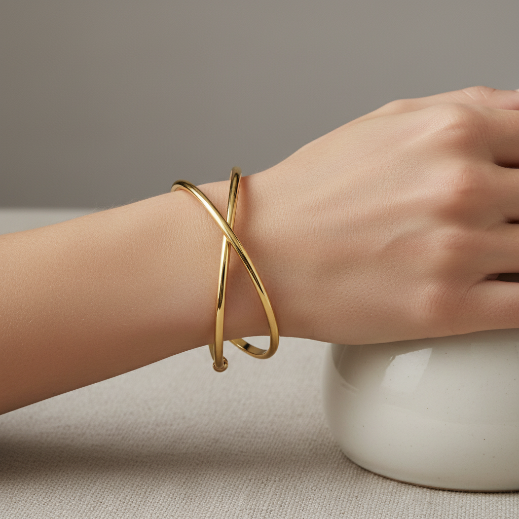 Gold Criss Cross Bracelet on Womans Wrist