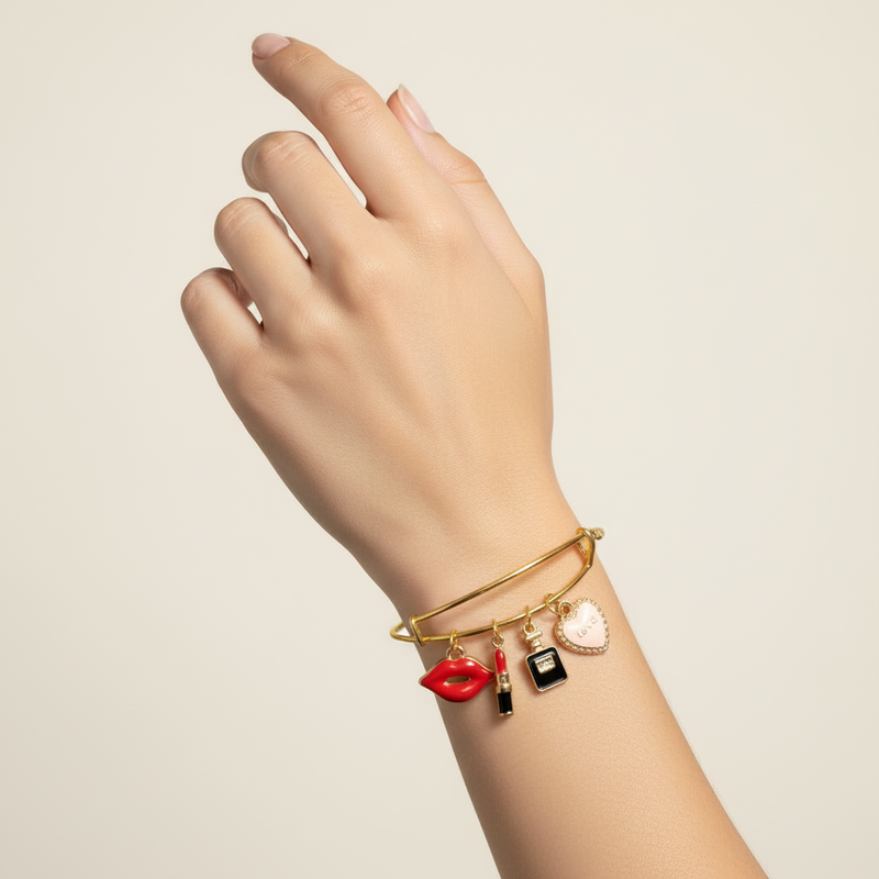 Gold Bangle Beauty Charm Bracelet on woman's wrist.