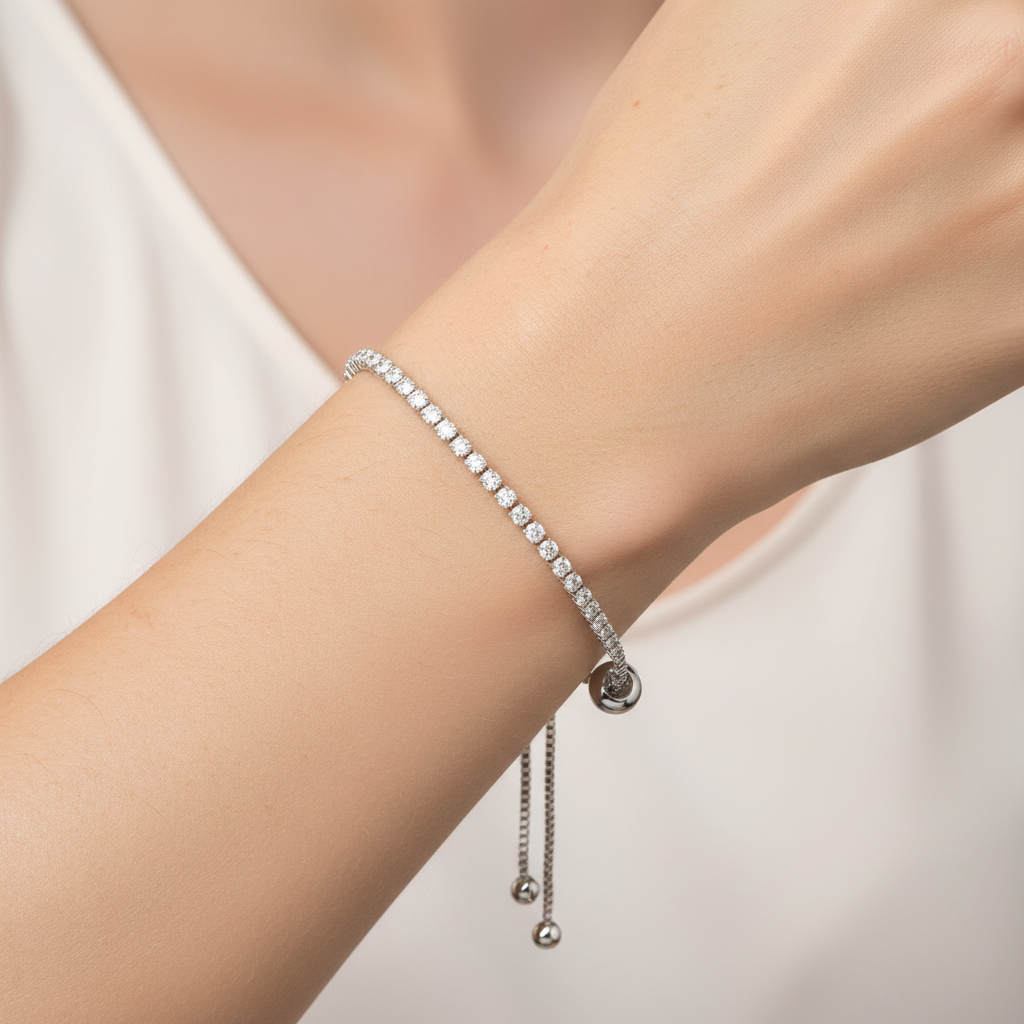 Crystal Adjustable Silver Tennis Bracelet On A Womans Wrist.