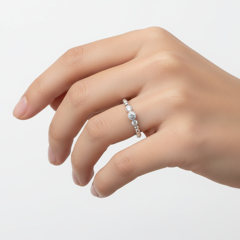 CZ Round Stone Ring On A Hand.