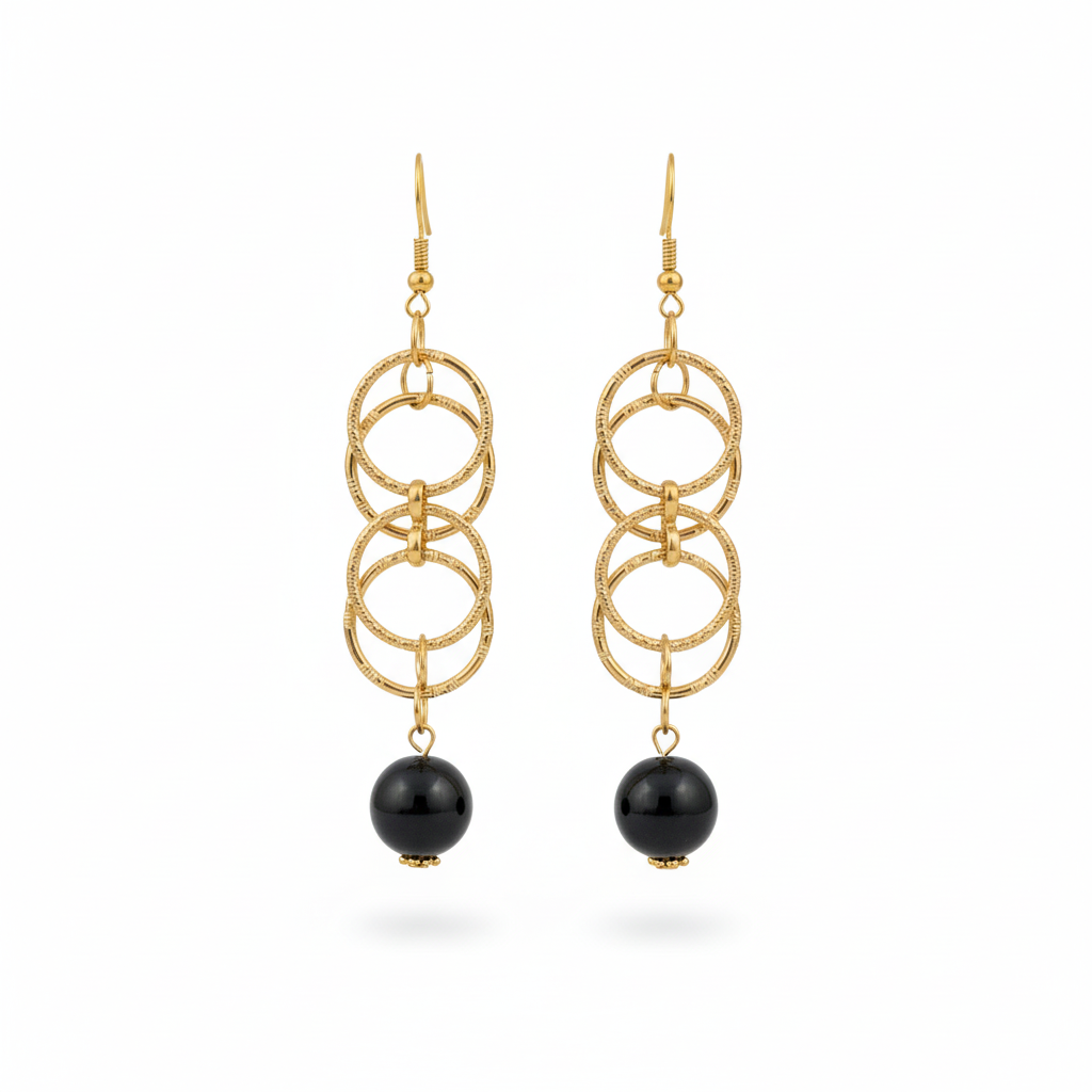 Gold multi-ring earrings with black bead.