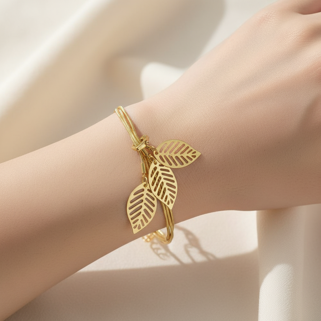 Gold Snake Chain Bracelet On A Womans Wrist.