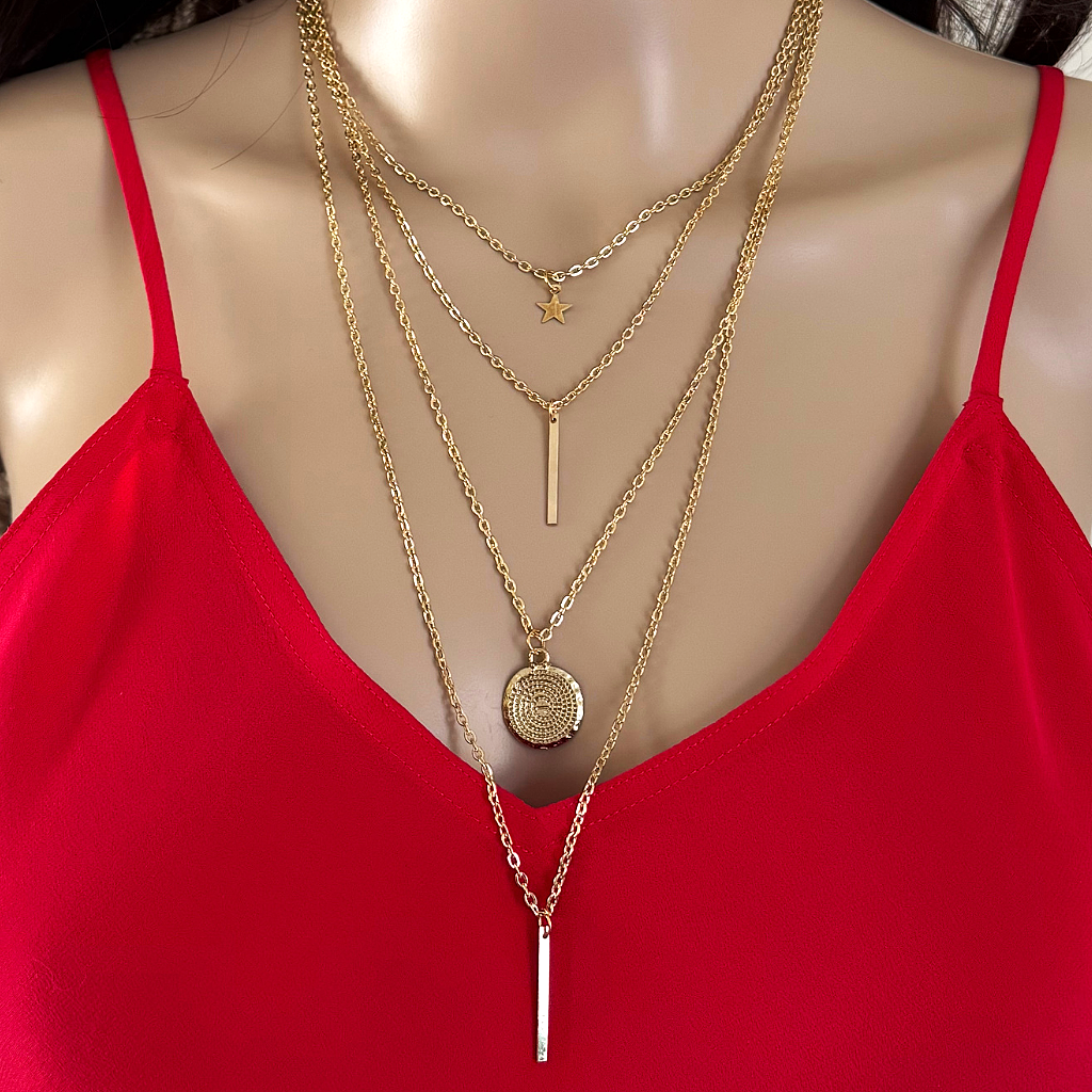 Four Gold Charm Layered Chain Necklace.