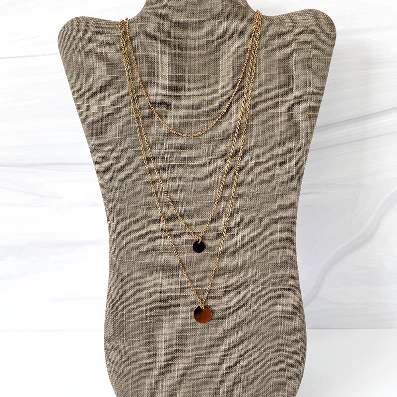 Gold Triple Layered Long Disc Necklace. Measures 15", 20" and 22" long.