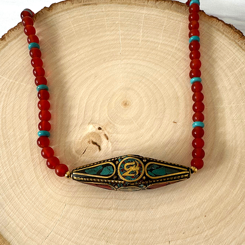 Mens Matte Carnelian and Turquoise Howlite Beaded Necklace With Metal Focal Bead Displayed