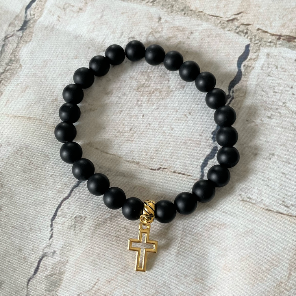 Buy the Mens Matte Black Onyx Beaded Bracelet with Gold Cross | JaeBee
