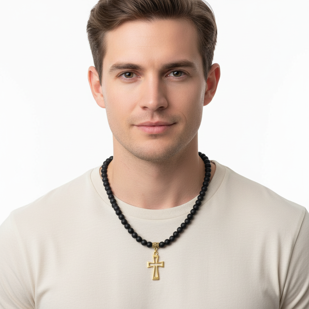 Matte Black Onyx and Gold Cut Out Cross Necklace On A Man.