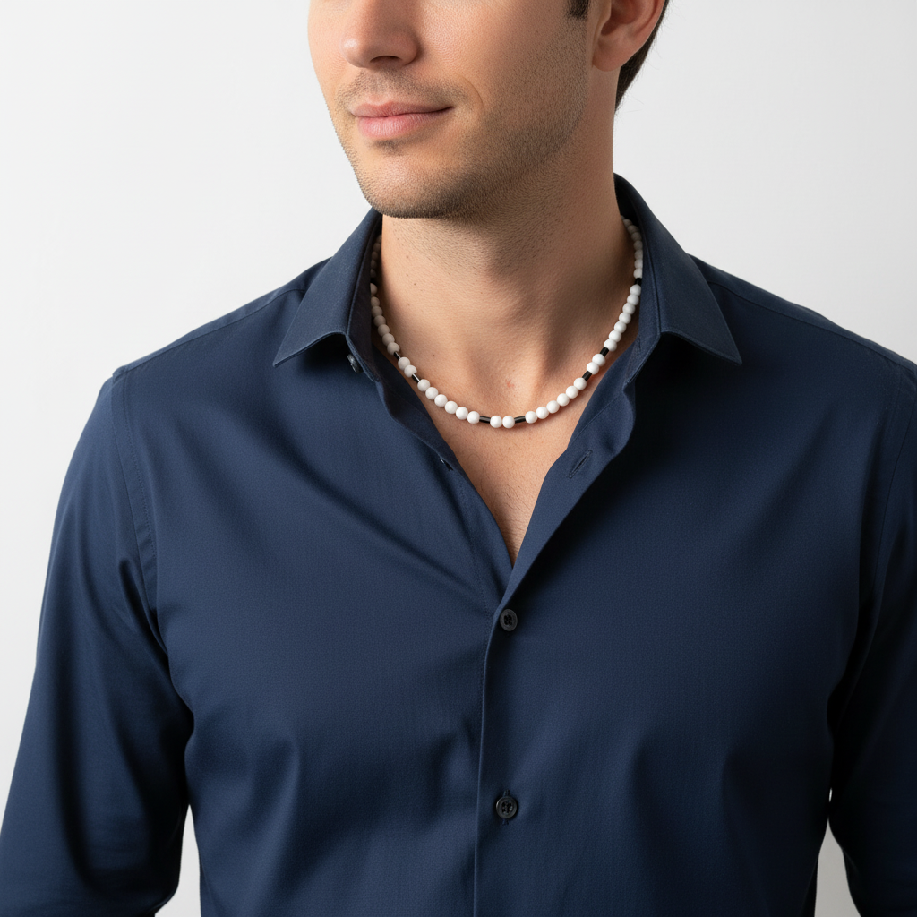 Men's White Shell and Black Hematite Necklace On A Man.
