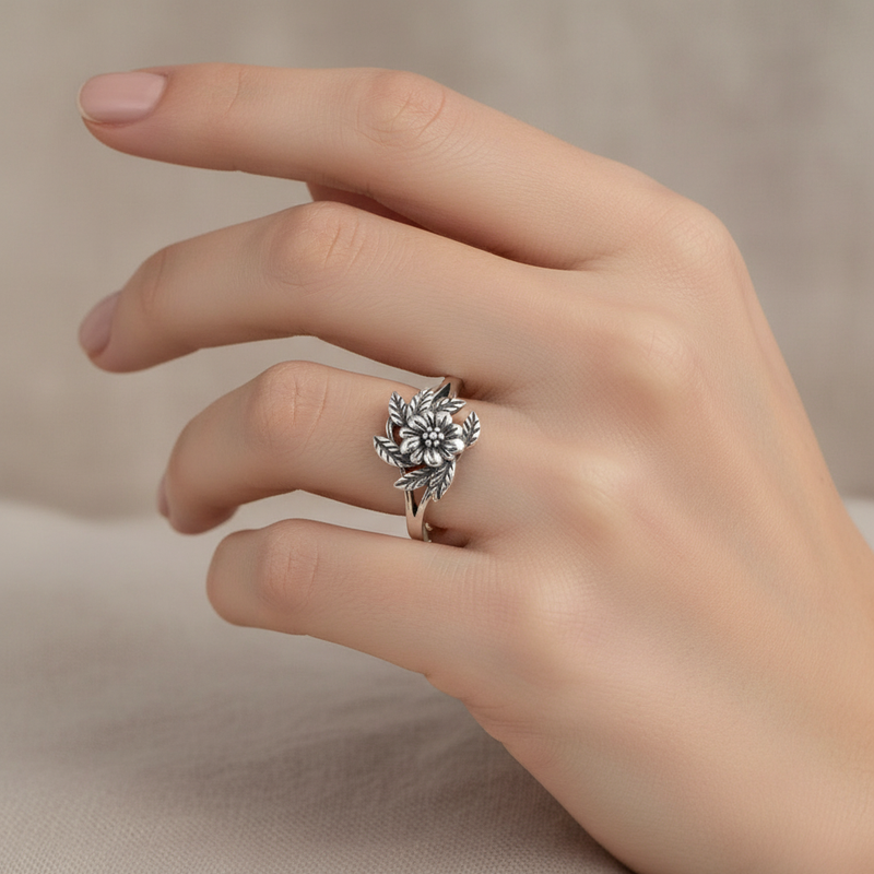 Rose and Leaves Ring On A Hand.