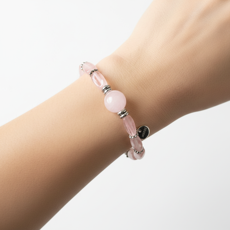 Rose Quartz Bracelet On A Wrist.