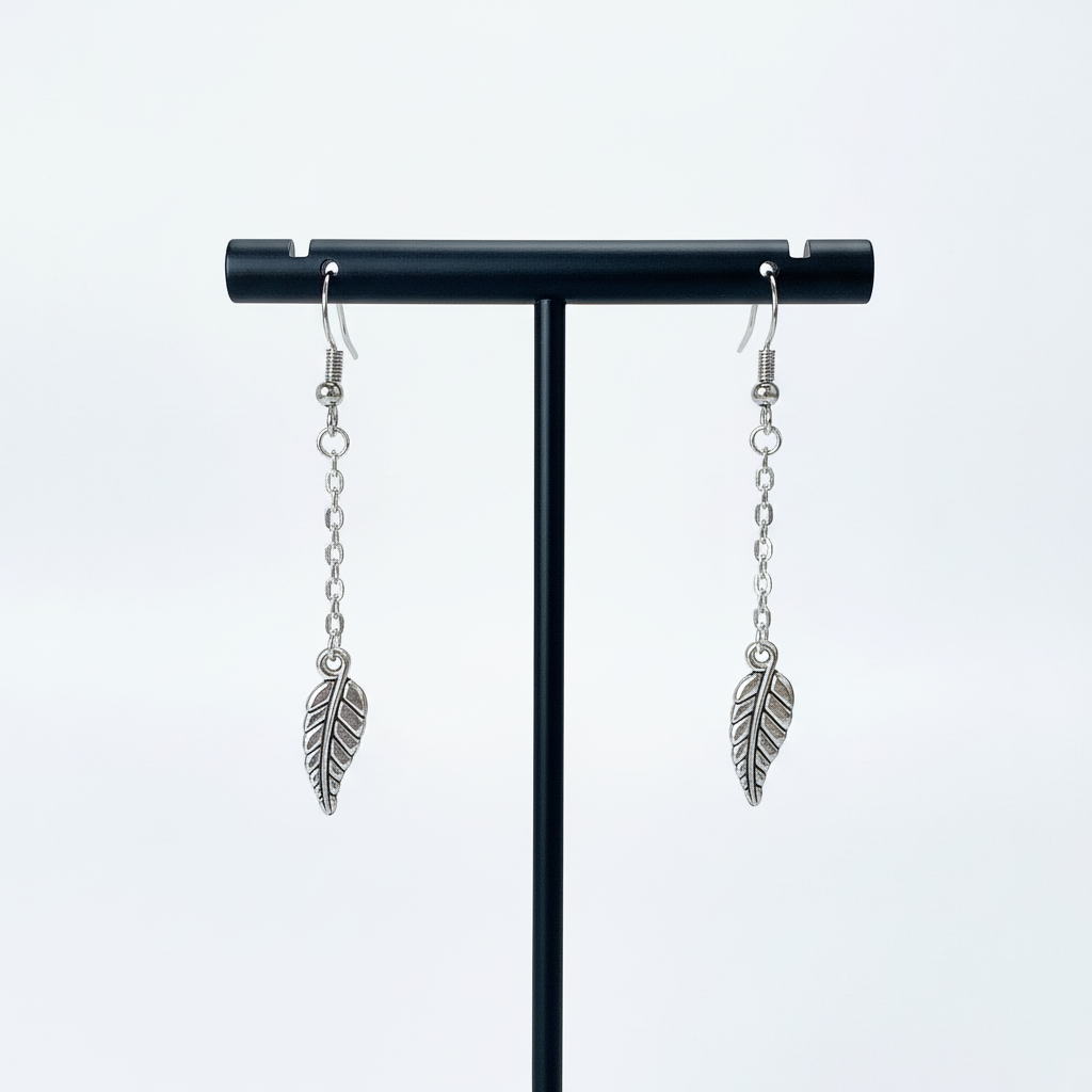 Silver Leaf Dangle Earrings on Premium Stand.