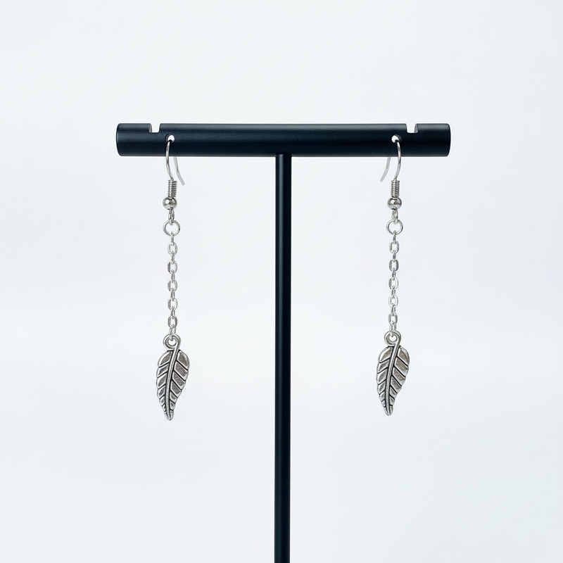 Silver Leaf Dangle Earrings on Premium Stand.