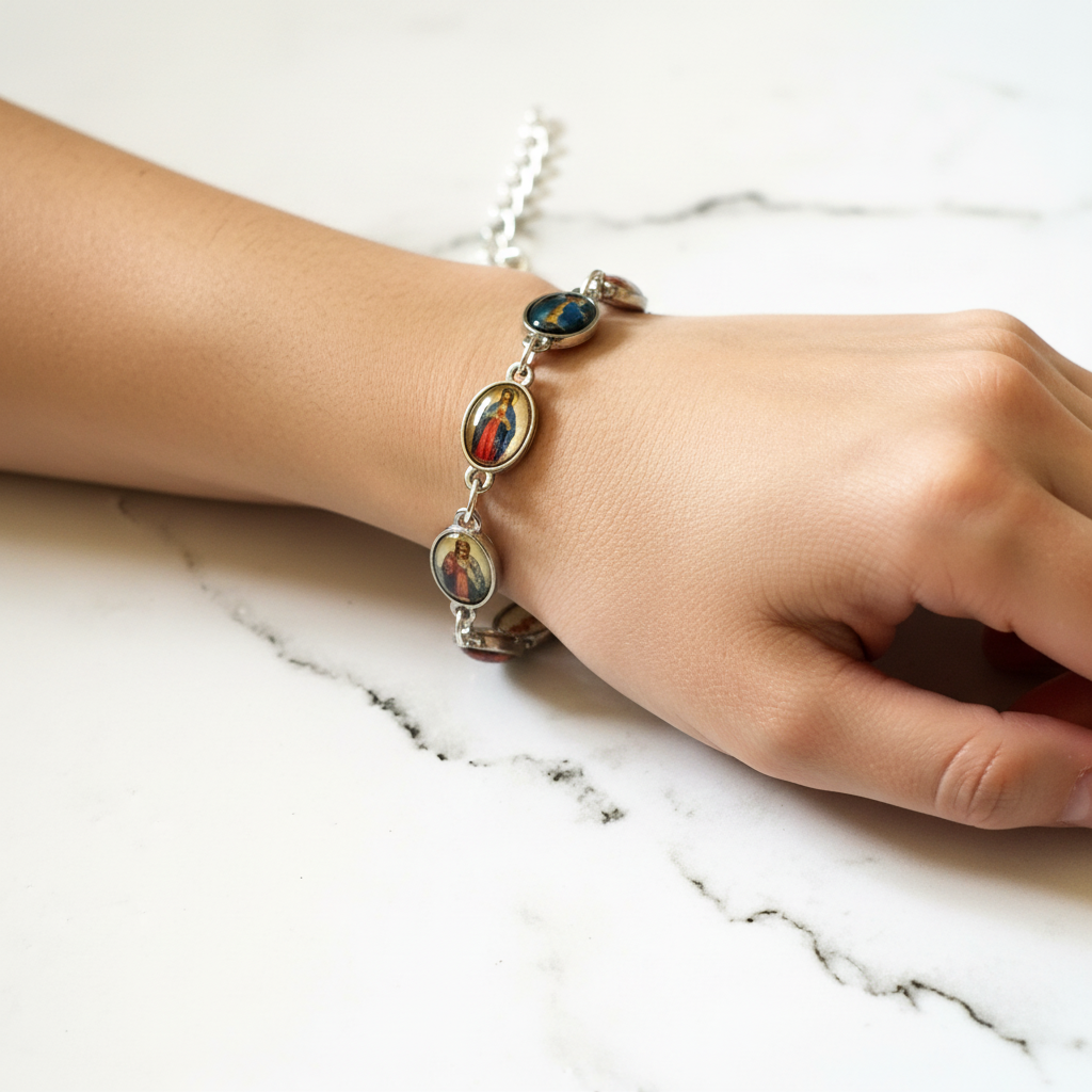 Silver Religious Saint Link Bracelet On a Wrist.