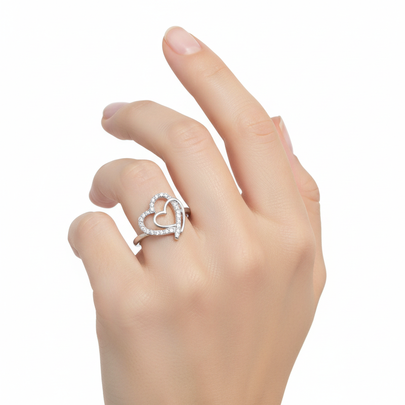 Sterling Silver and CZ Double Heart Ring On A Hand.