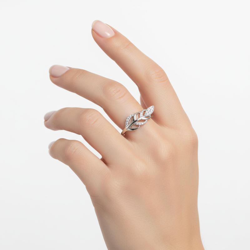 Sterling Silver and CZ Leaf Ring On A Hand.