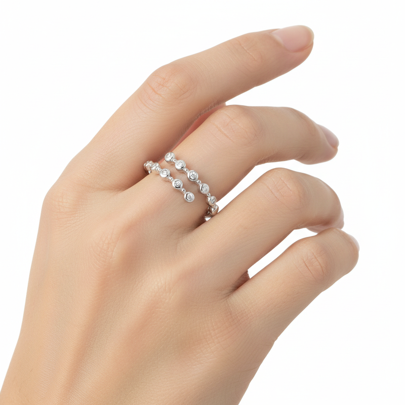 Sterling Silver and CZ Open Wrap Ring On A Hand.