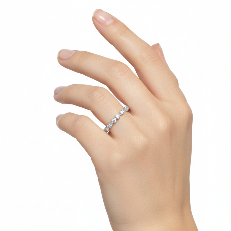 Sterling Silver and CZ Ring Band On A Hand.